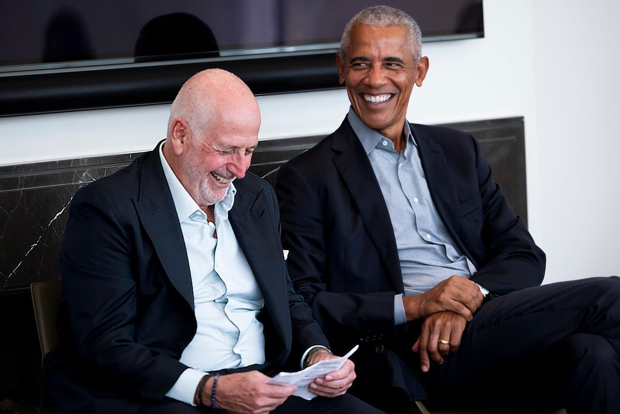 Gary Lubner and President Barack Obama sat down having a conversation together and smiling